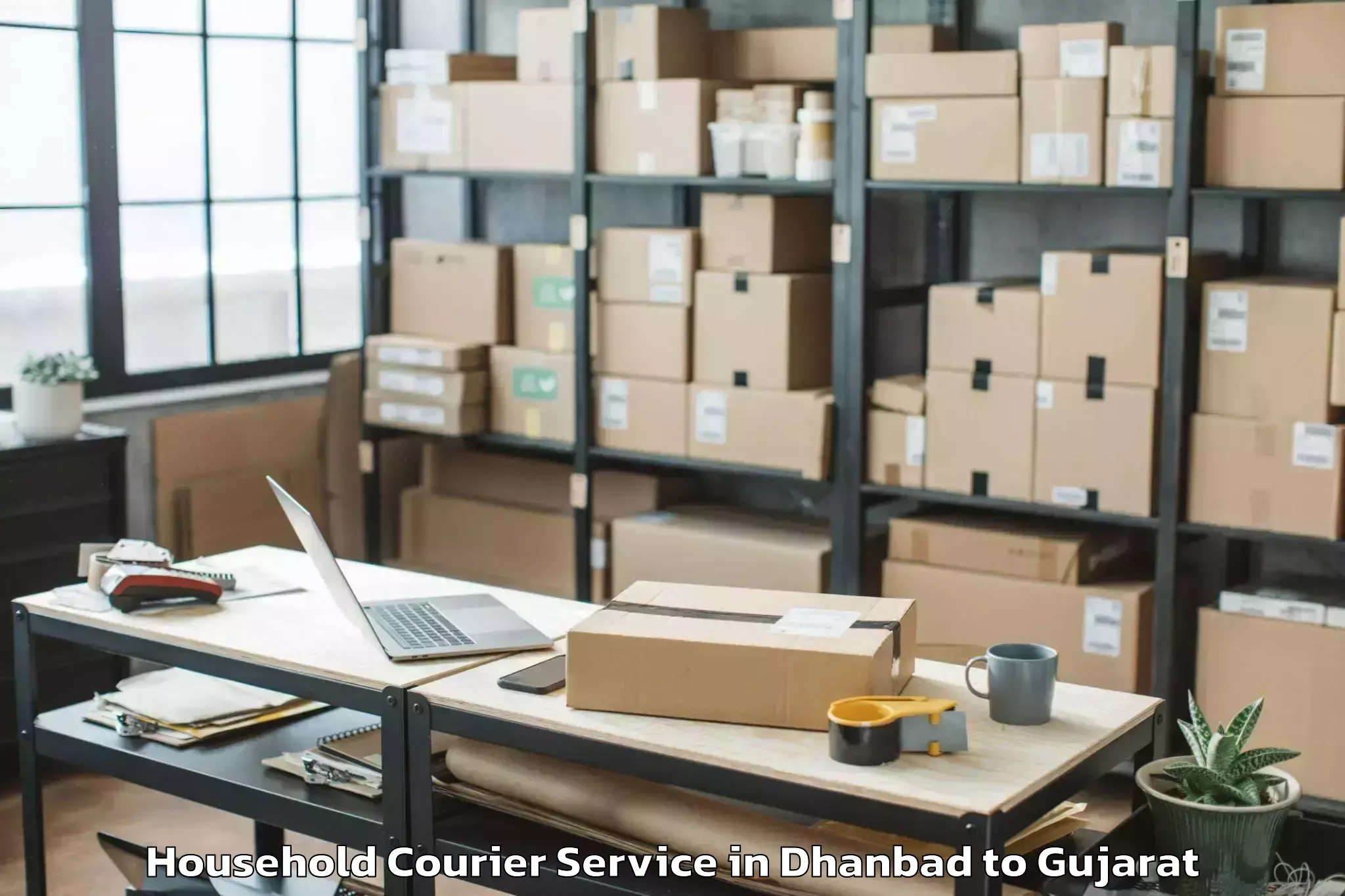 Efficient Dhanbad to Garbada Household Courier